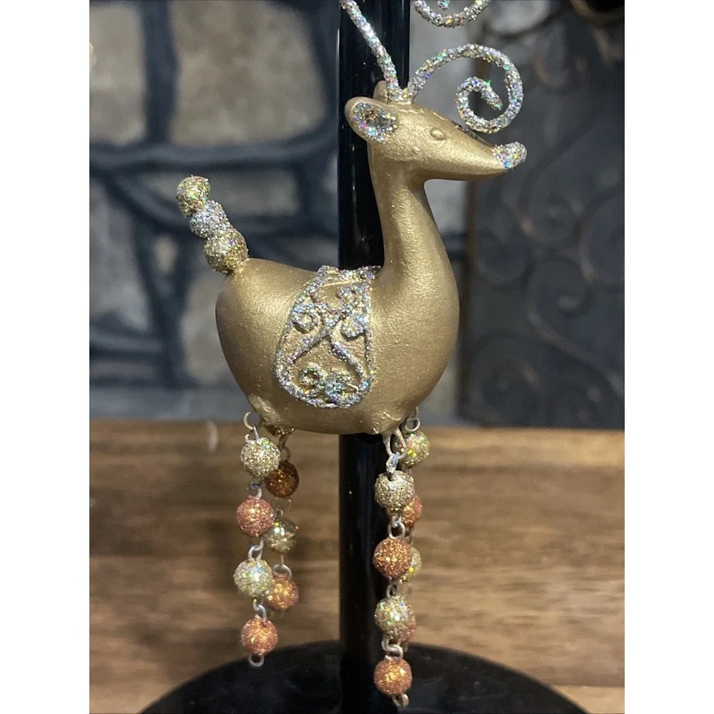 Pier 1 Reindeer Christmas ornament glittery gold style with beaded dangly legs